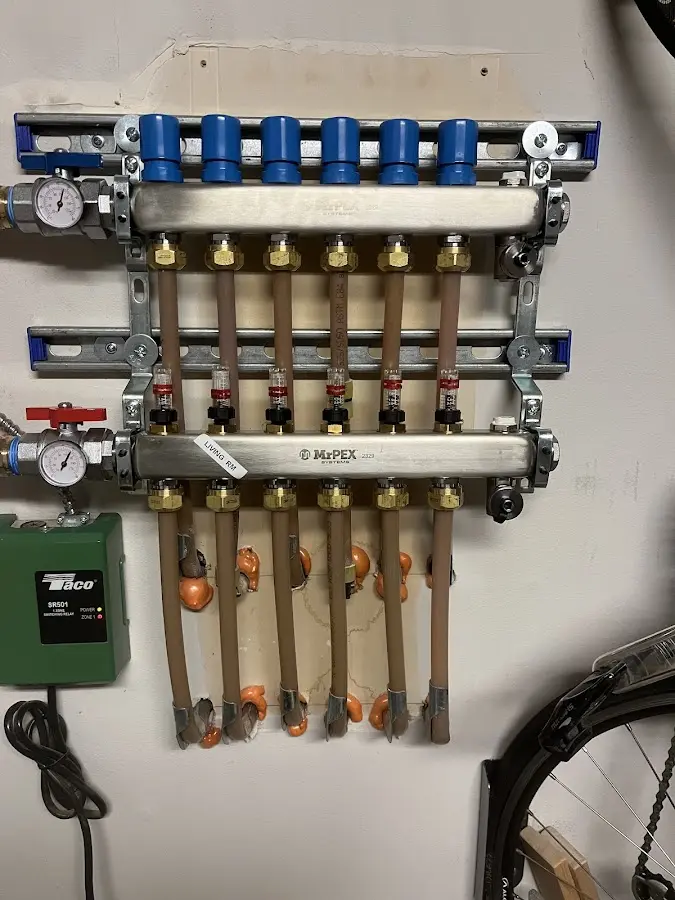 Plumber performing Leak Detection at a residential property in North Branford